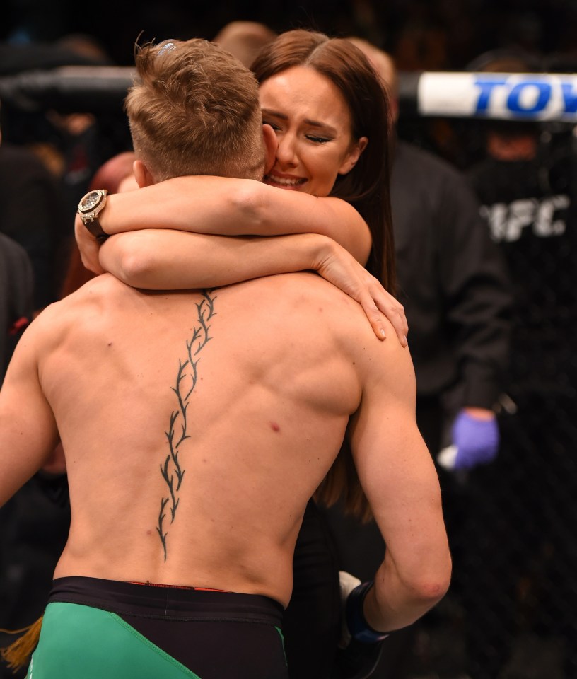 Dee Devlin congratulates McGregor after he defeats Aldo