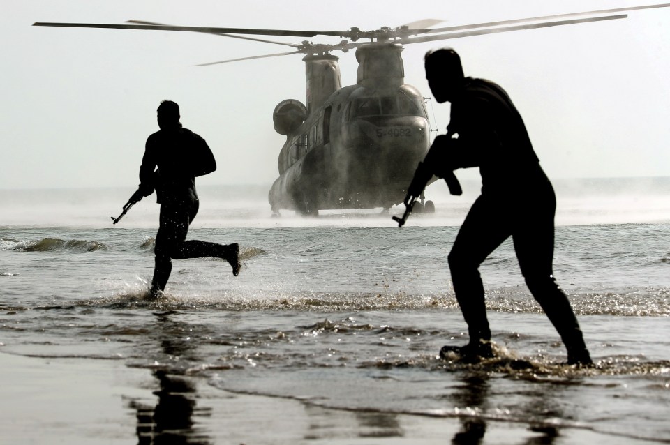 Commando units participate in the military drill along the coast of Oman