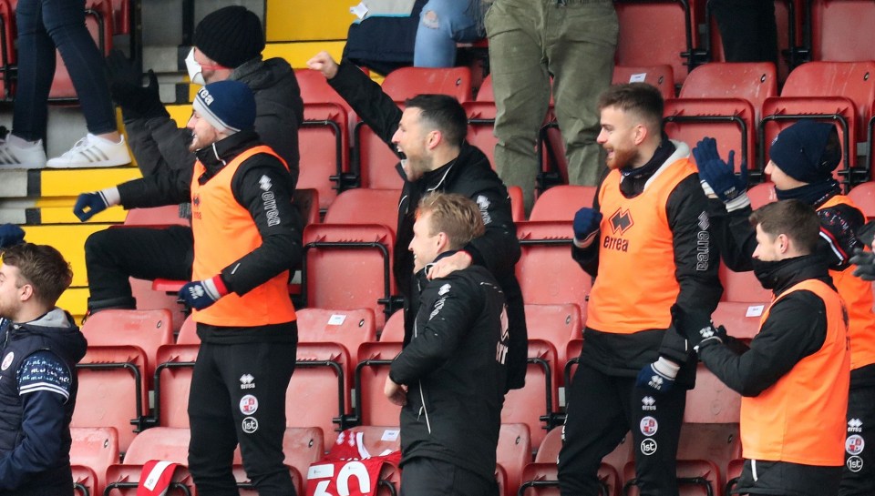 Celebrity Mark Wright celebrates with his team-mate and brother Josh in the crowd