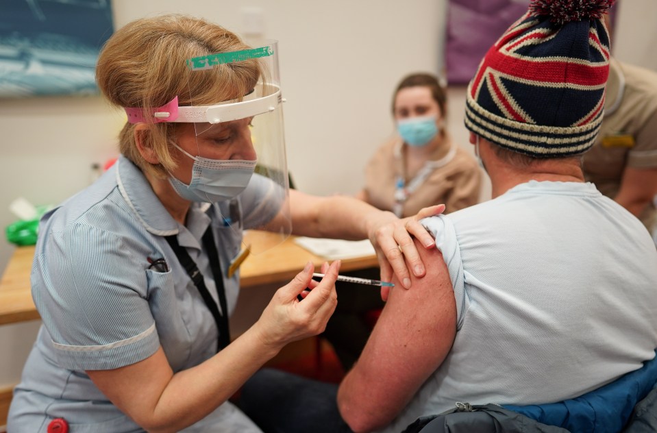 A key worker gets the jab at a mass vaccination hub at the Centre For Life in Newcastle