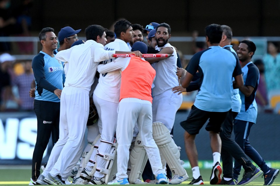 India's star men sprinted onto the field as the win was confirmed