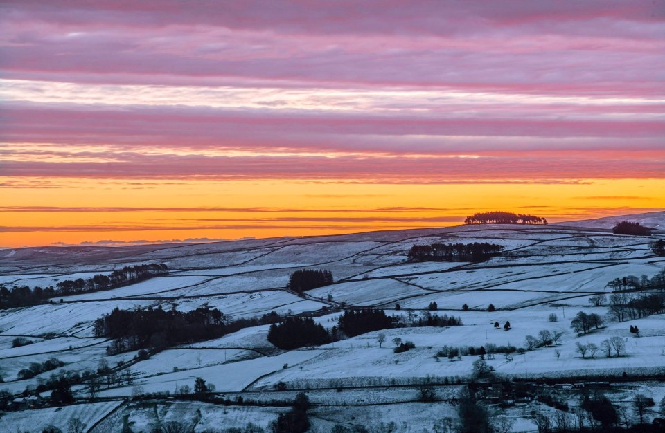 A sunrise set against the backdrop of snow in Allendale, Northumberland was seen yesterday morning as temperatures dropped down