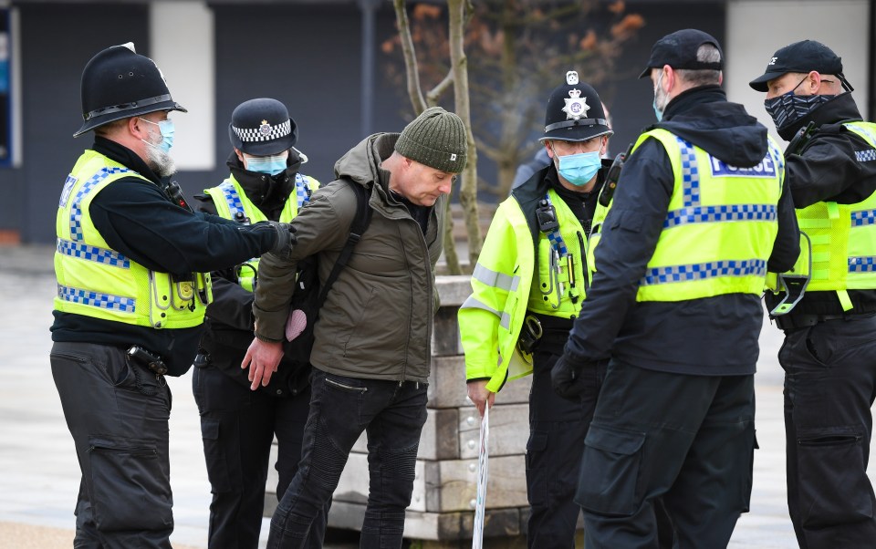 Officers are seen arresting a man at Bournemouth