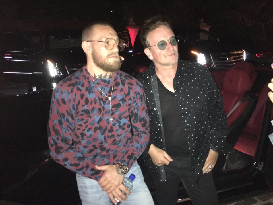 Friends in high places - McGregor poses with pal and fellow Irishman Bono 