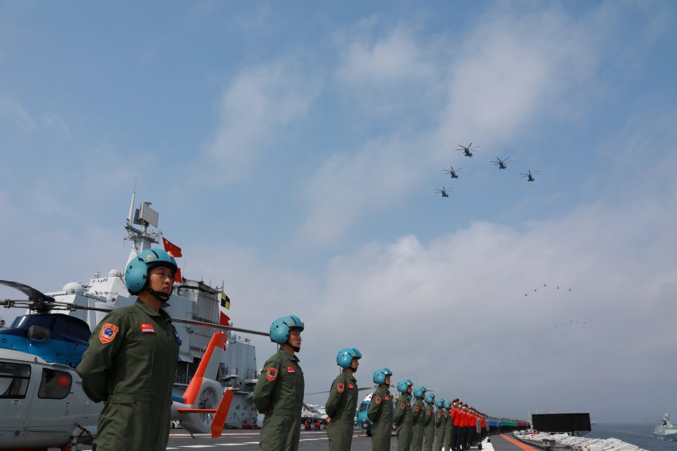 The Chinese People's Liberation Army Navy take part in a military display in the South China Sea in 2018