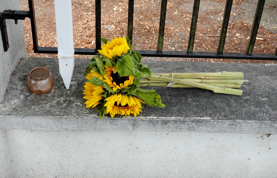 Flowers left outside the Acton home