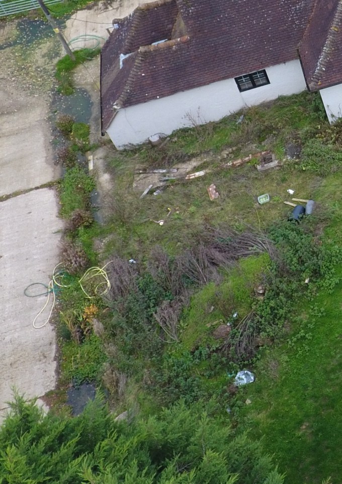 Previous photographs showed a build up of waste from a leaking septic tank at the side of the 42-year-old's property. Pictured in 2019