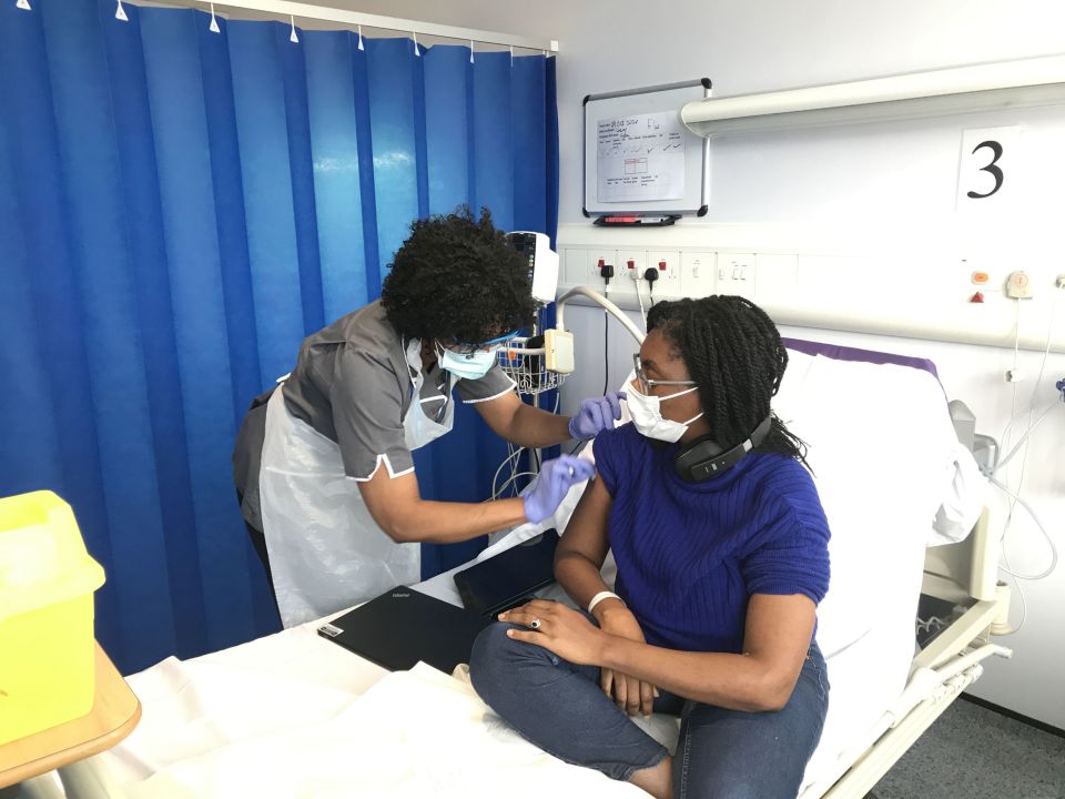 Minister for Equalities, Kemi Badenoch, receiving her first Covid vaccination