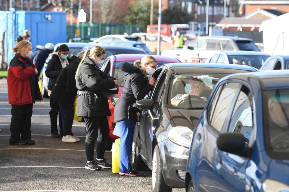 Staff delivering vaccines at a centre in Hyde, Greater Manchester, in December 2020