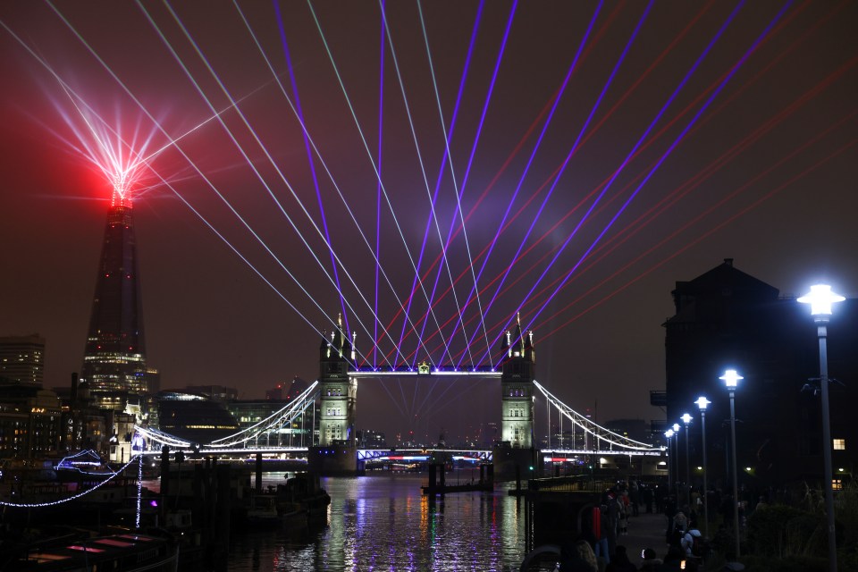 A light show is seen over Tower Bridge