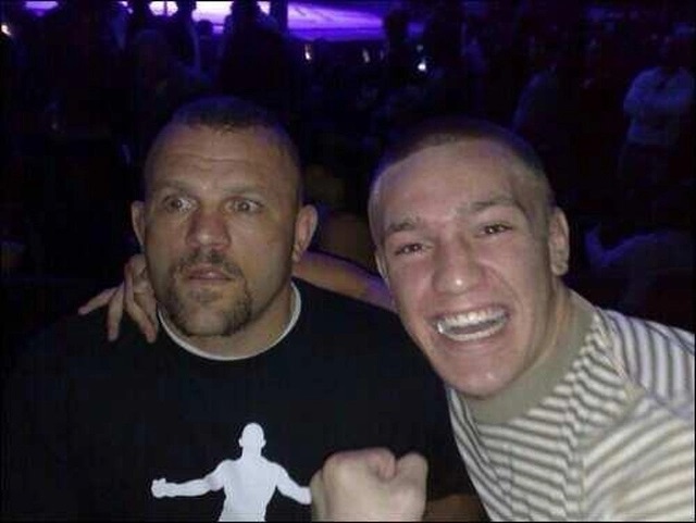 UFC legend Chuck Liddell shares a joke with a young McGregor