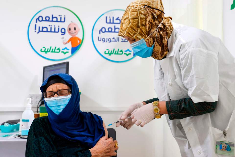 Patients being vaccinated in Israel, which has the fastest vaccine programme of any country at the moment