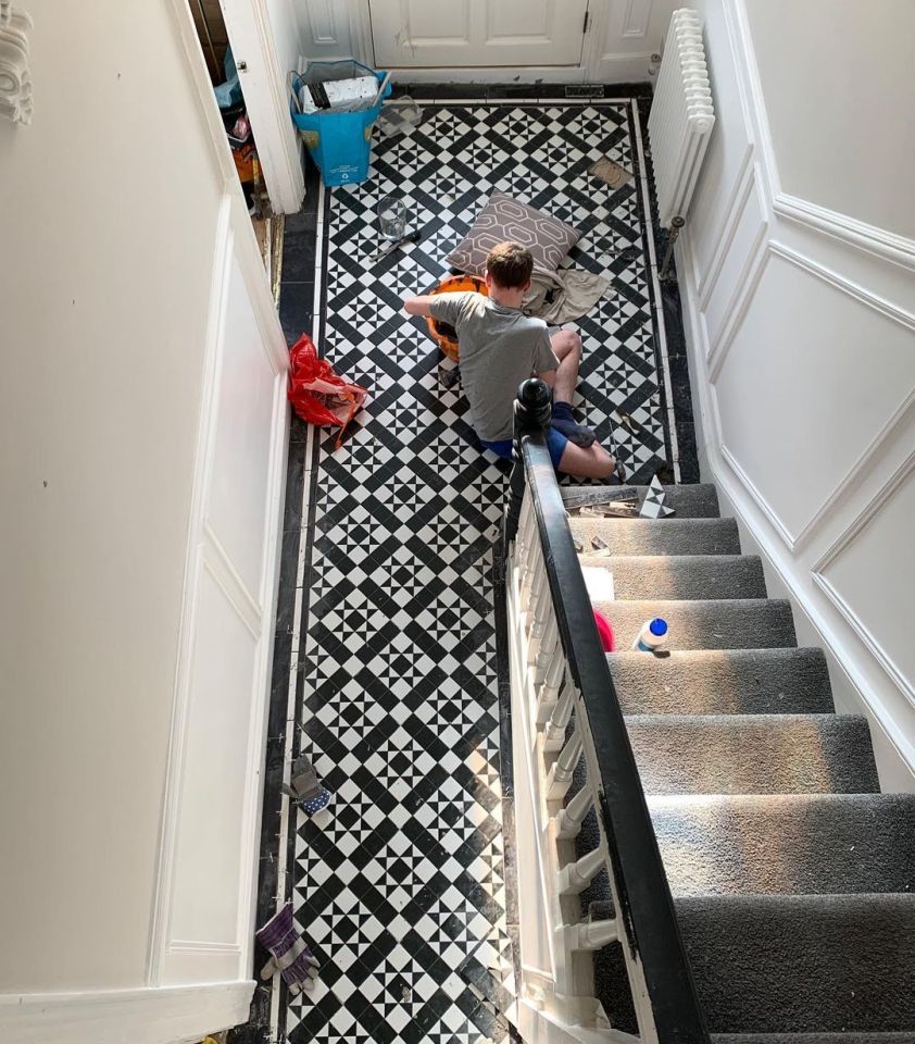 Sam spent hours cutting and templating the tiles which they laid themselves 