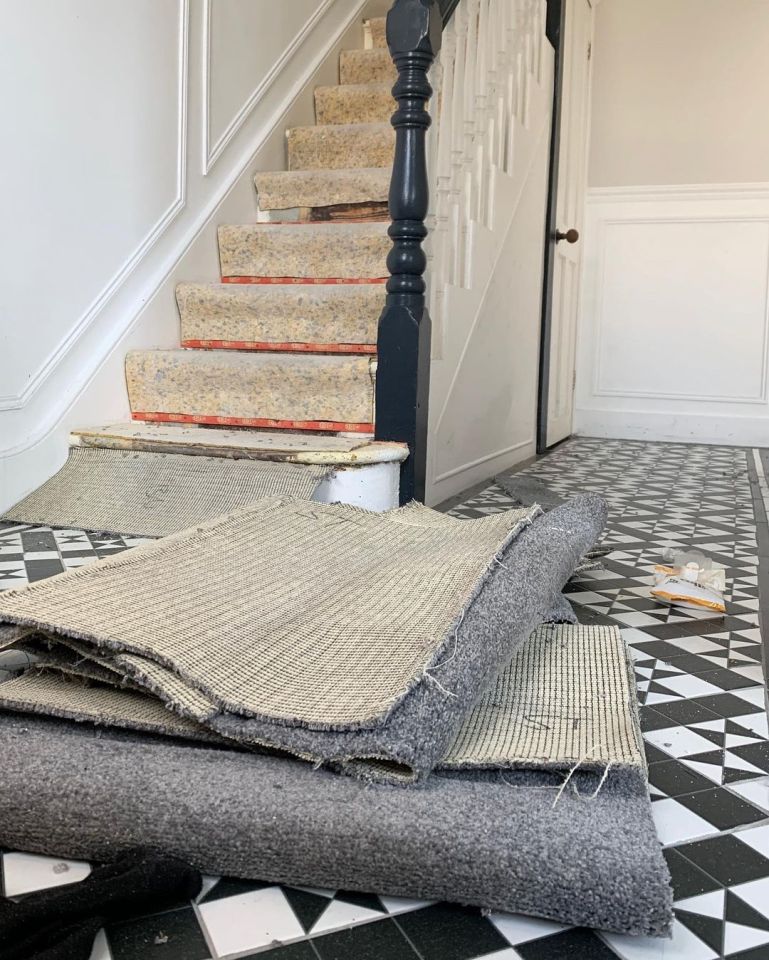 The couple stripped the carpet and Sam made his own panelling for the stairs