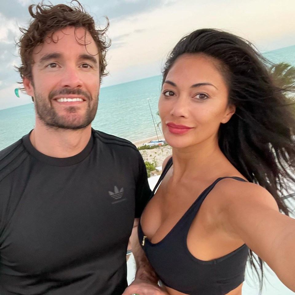 Nicole shared this photo while holidaying with boyfriend Thom Evans