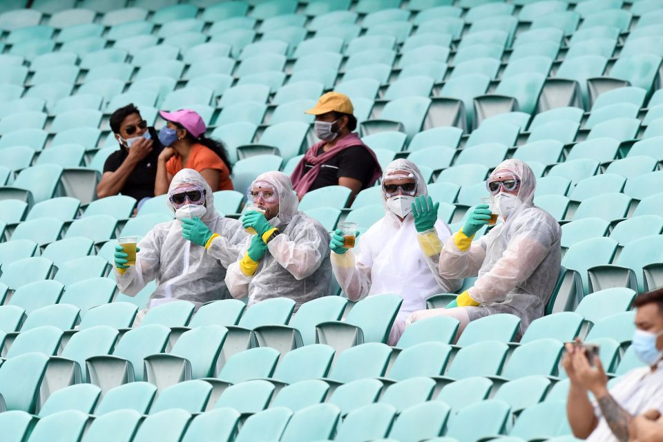 Australian cricket fans donned full hazmat suits for their countries' Test match against India