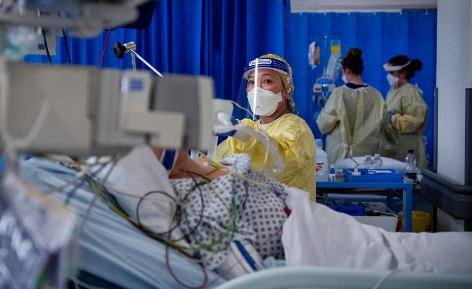 Nurses work on patients in the ICU (Intensive Care Unit) in St George's Hospital in Tooting, south-west London, January 6