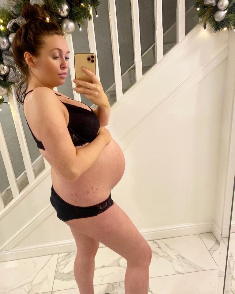 In her mirror selfie, a fresh-faced Charlotte cradled her baby bump in black underwear