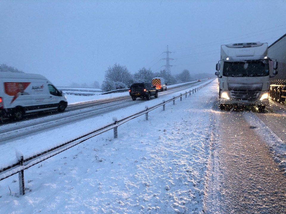 Traffic on the A1 in County Durham, 20 miles south of Newcastle upon Tyne, in heavy snow this morning