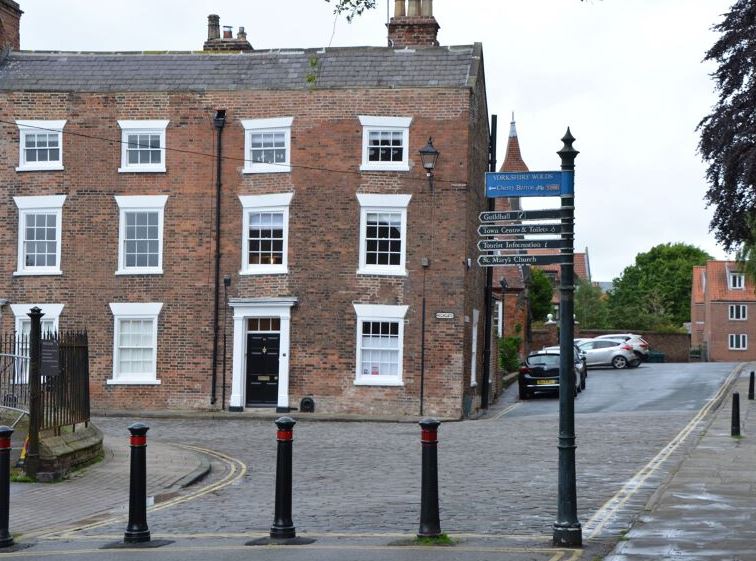 Wonky windows are this townhouse's trademark