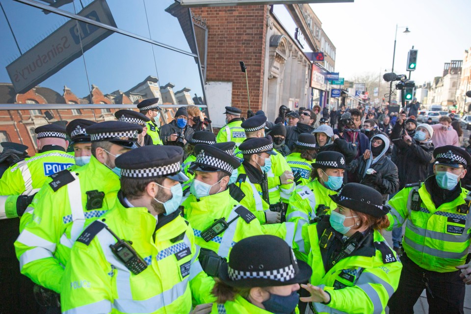 Police were forced to move in as the protesters gathered in the streets - ignoring guidance to keep safe