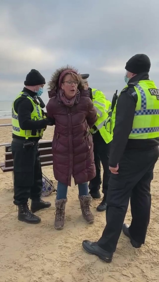 A woman 'sitting on a bench' was arrested in Bournemouth 