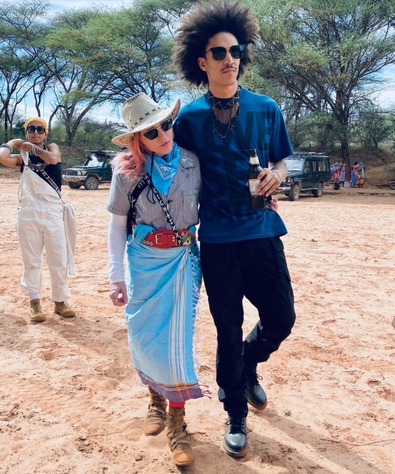 Madge and dancer boyfriend Ahlamalik take a cosy stroll together