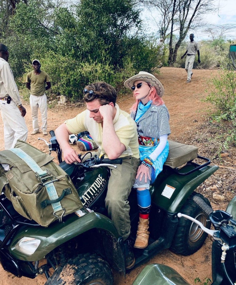 Mum and son Rocco enjoy a moment together on a quad bike