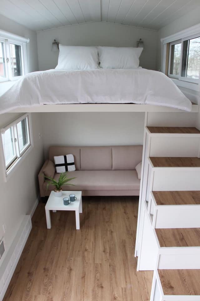 This bed is suspended so high it looks like there is a whole other room underneath