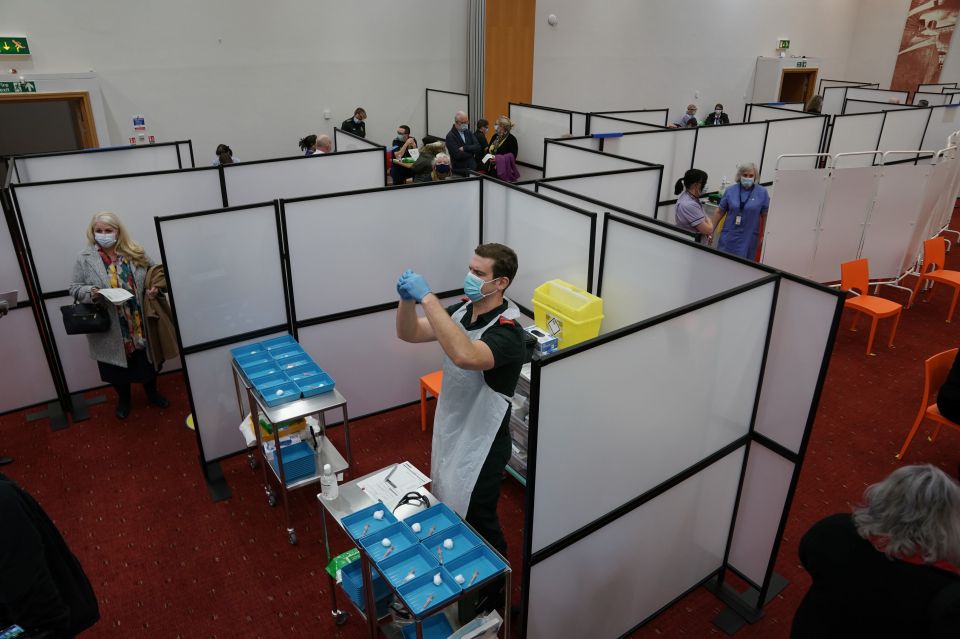 A healthcare workers fills a syringe with a Covid-19 vaccine at the NHS vaccine centre that has been set up at the Centre for Life in Times Square, Newcastle