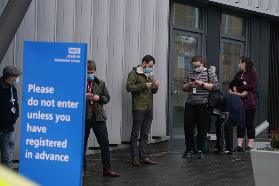 Patients are seen lining up for a vaccine in Newcastle this morning