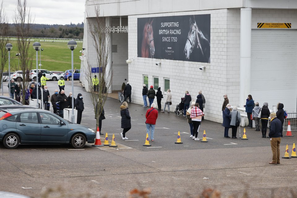 Cones mark social distancing for people lining up for a vaccine in Surrey this afternoon