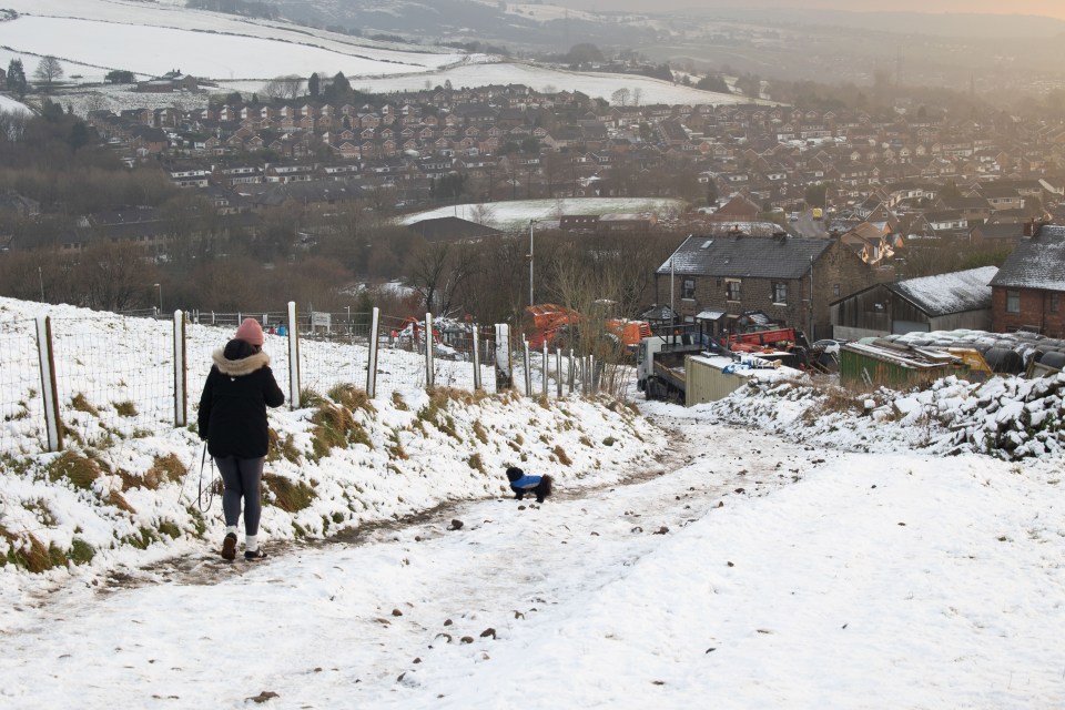 Snow scenes during sunset at the foot of the Pennines in Mossley, Greater Manchester