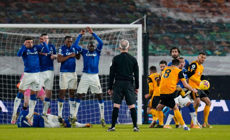 Ruben Neves fires a late free-kick at the Everton goal