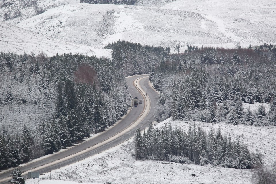 Inverness in Scotland is seen blanketed by snow this afternoon, with an amber weather warning issued for the area