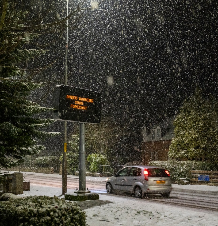 The A68 in the Scottish Borders is seen covered in snow as an amber weather warning was issued 