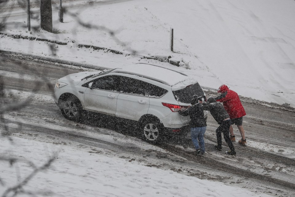 Cars battled to make their way uphill in Barnsley, South Yorkshire, as icy roads caused chaos