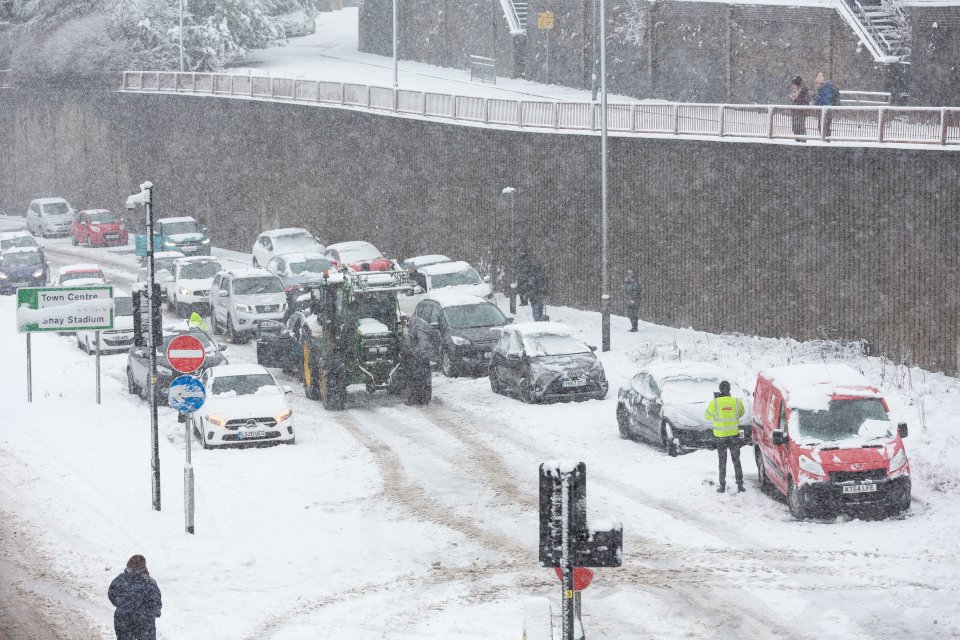 Travel chaos continued in Halifax, with a row of cars abandoned and drivers stuck in the snow