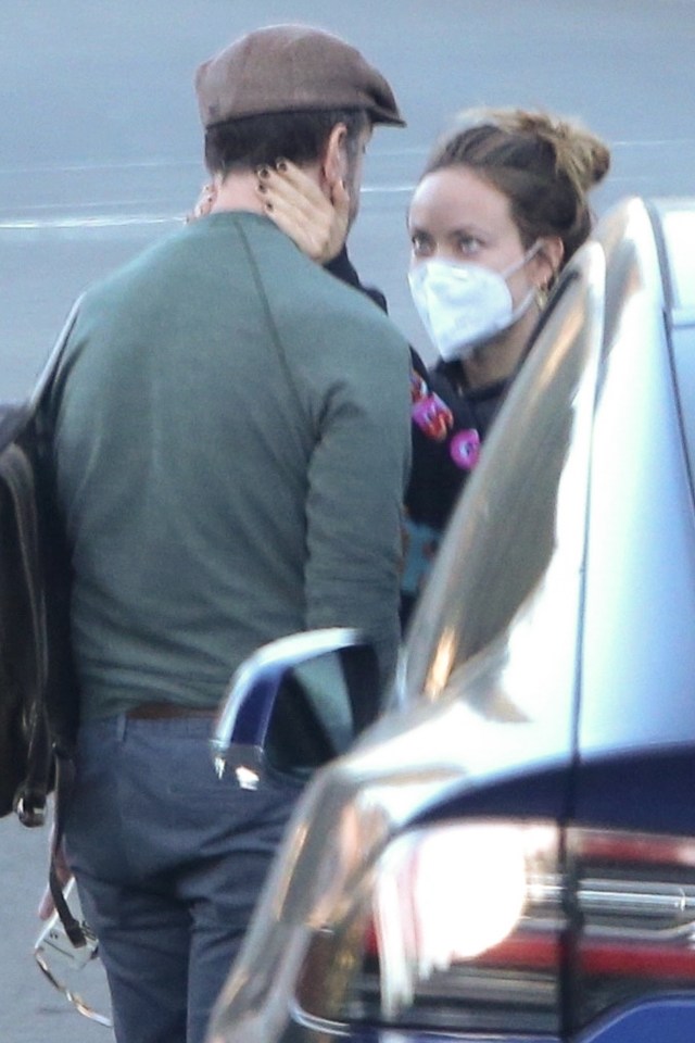 The actress was also spotted holding her ex's face in her hands