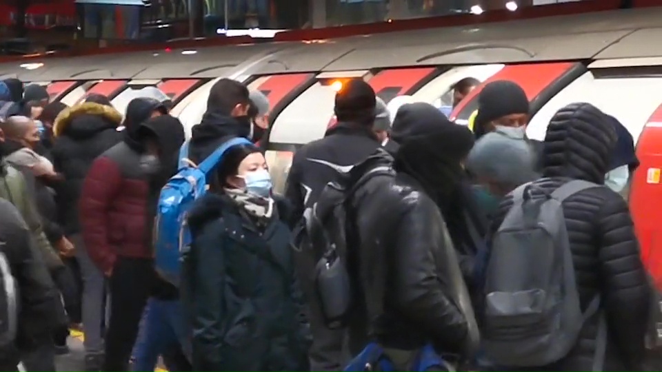 Brits were seen packing onto Tube carriages at Canning Town this morning