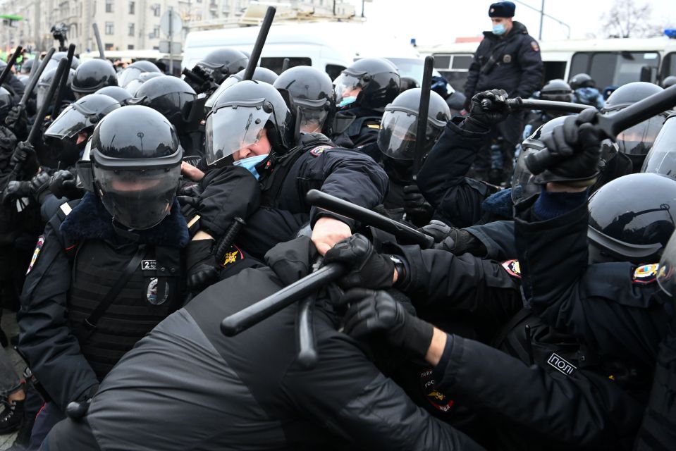 Protesters clash with riot police during the rally