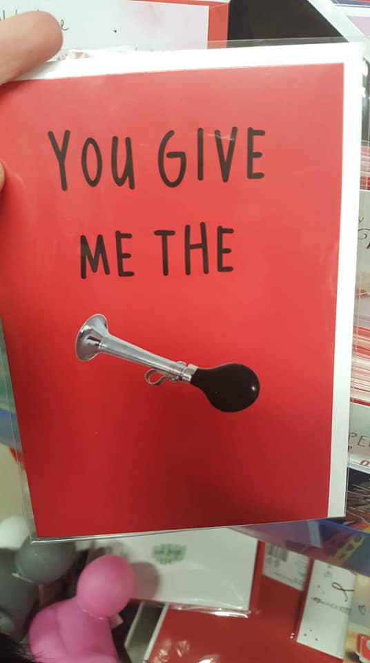 Another card jokes about giving someone 'the horn'