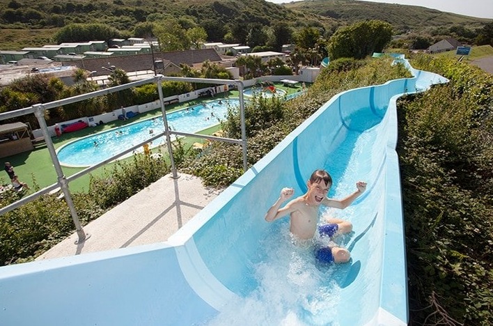 Slip down a 300ft waterslide at Holywell Bay Park