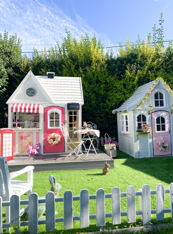 The girls love their personalised houses, which dad Steve jazzed up with a picket fence and fake grass