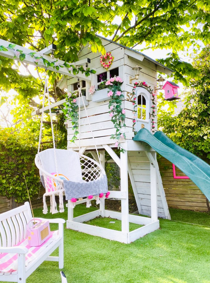 Lucy loves the personalised swing set and her girls' Wendy houses