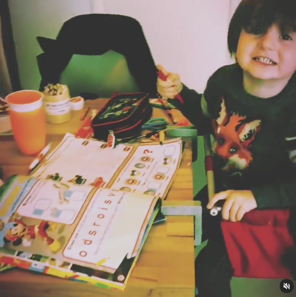 Gregory shows off his homeschooling set up 