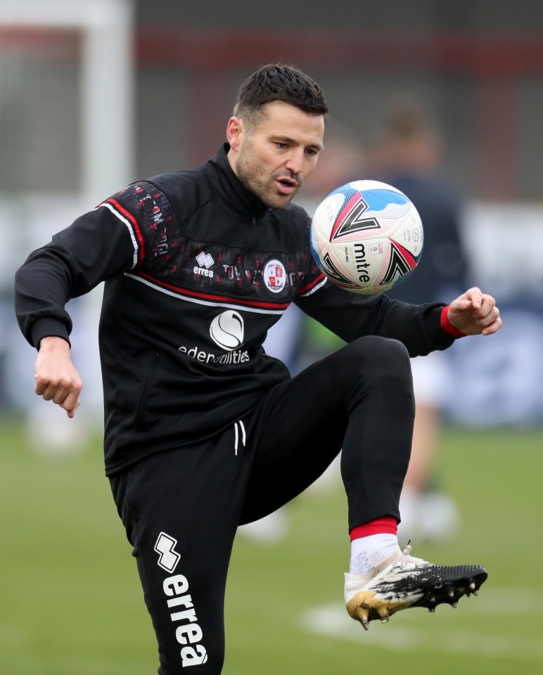 Mark Wright warms up ahead of Crawley's FA Cup clash with Leeds