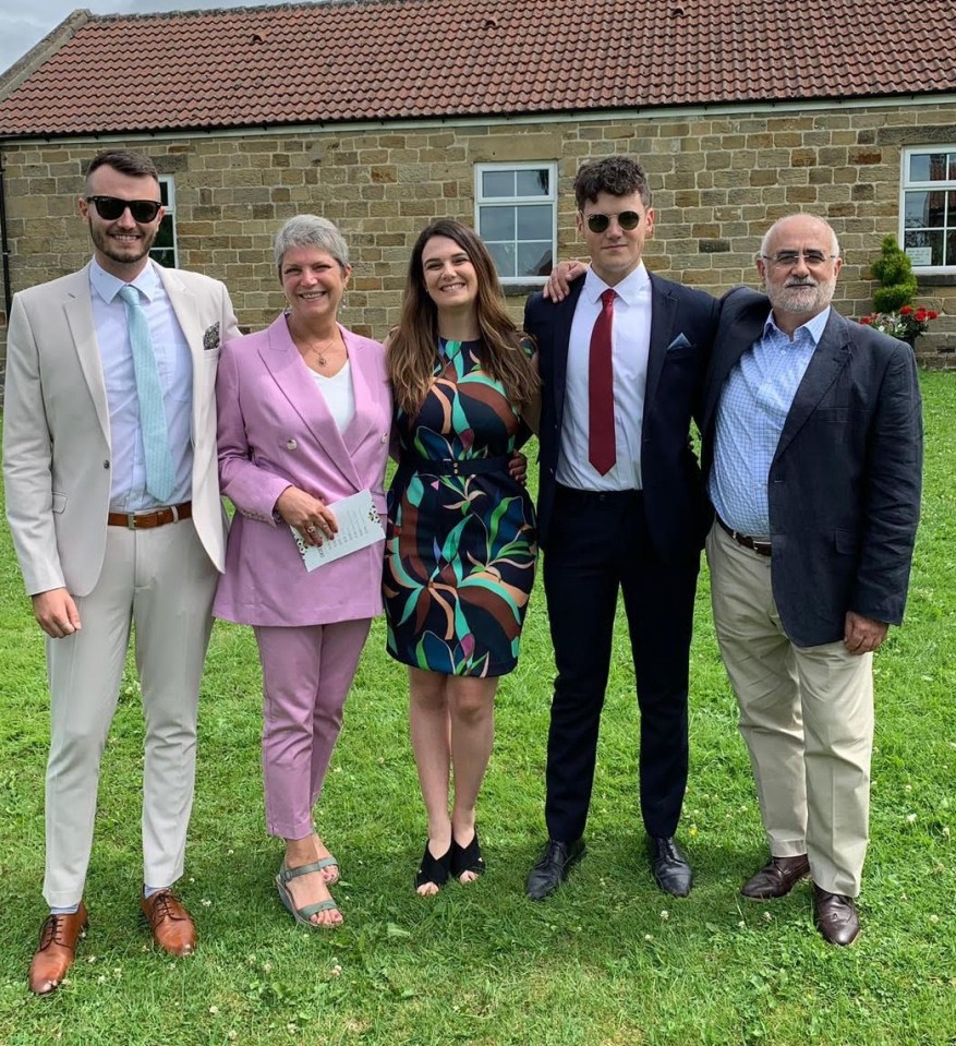 Anne pictured with her son George (L), daughter Peggy (centre), son Harry (R) and husband Bernard (R)  