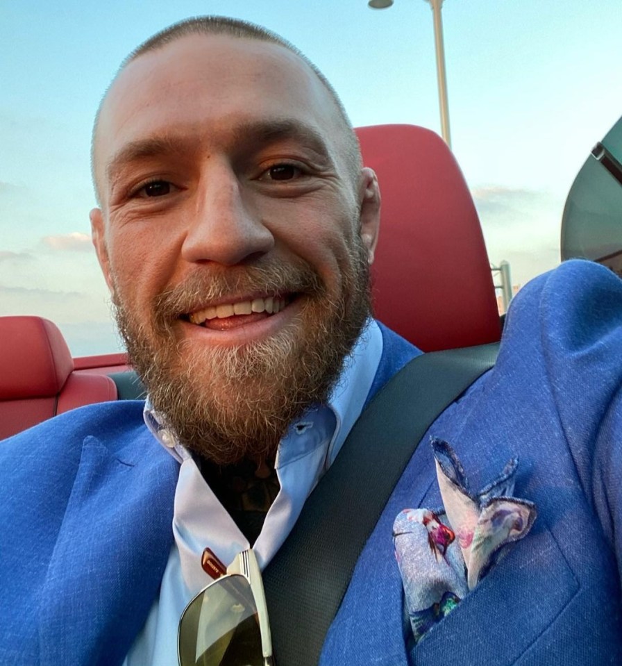 McGregor appeared to be in his element as he posed in his Rolls-Royce with the top down