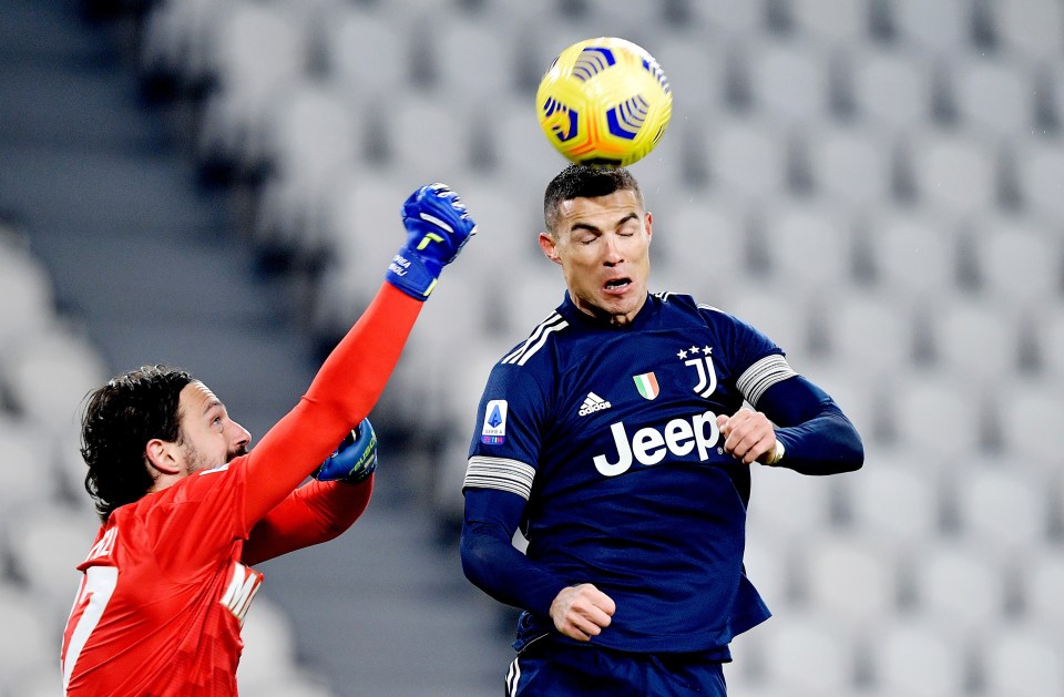 Cristiano Ronaldo won the header despite the keeper's best efforts